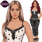 A stylized fashion illustration showing a woman modeling a matching two-piece outfit. The left close-up shows the top in white with black heart and lace trim, while the full-body view on the right shows the black pants with white hearts and a white-and-black patterned top pajamas with transparent background.