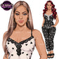 A stylized fashion illustration showing a woman modeling a matching two-piece outfit. The left close-up shows the top in white with black heart and lace trim, while the full-body view on the right shows the black pants with white hearts and a white-and-black patterned top pajamas with transparent background.